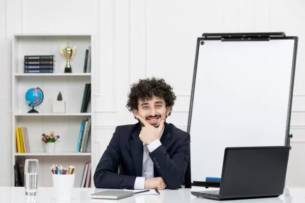 Customer service team with headsets smiling in office